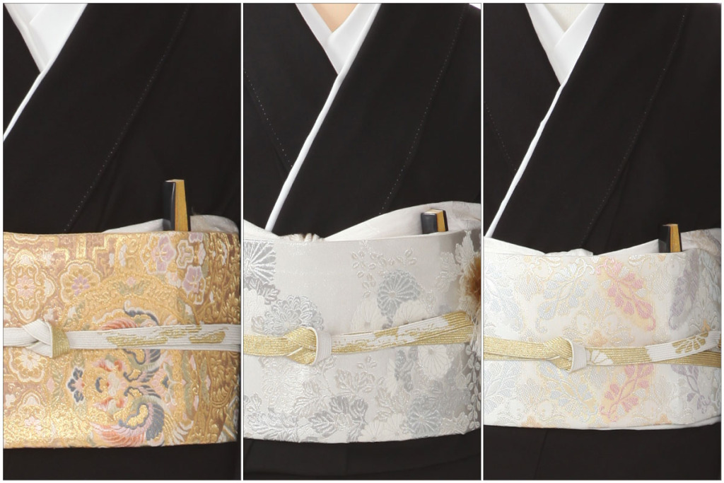 金銀白の袋帯を締めた黒留袖