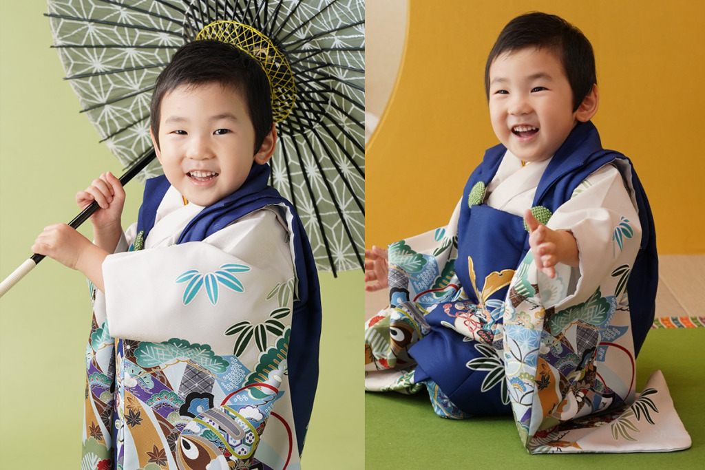 紺色とベージュの被布を着た男の子